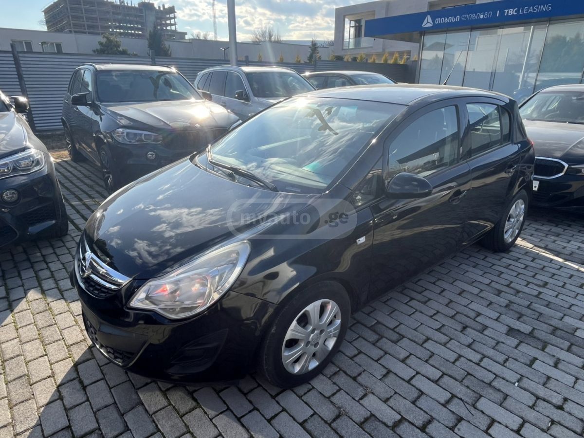Opel Corsa 2011 — photo 2