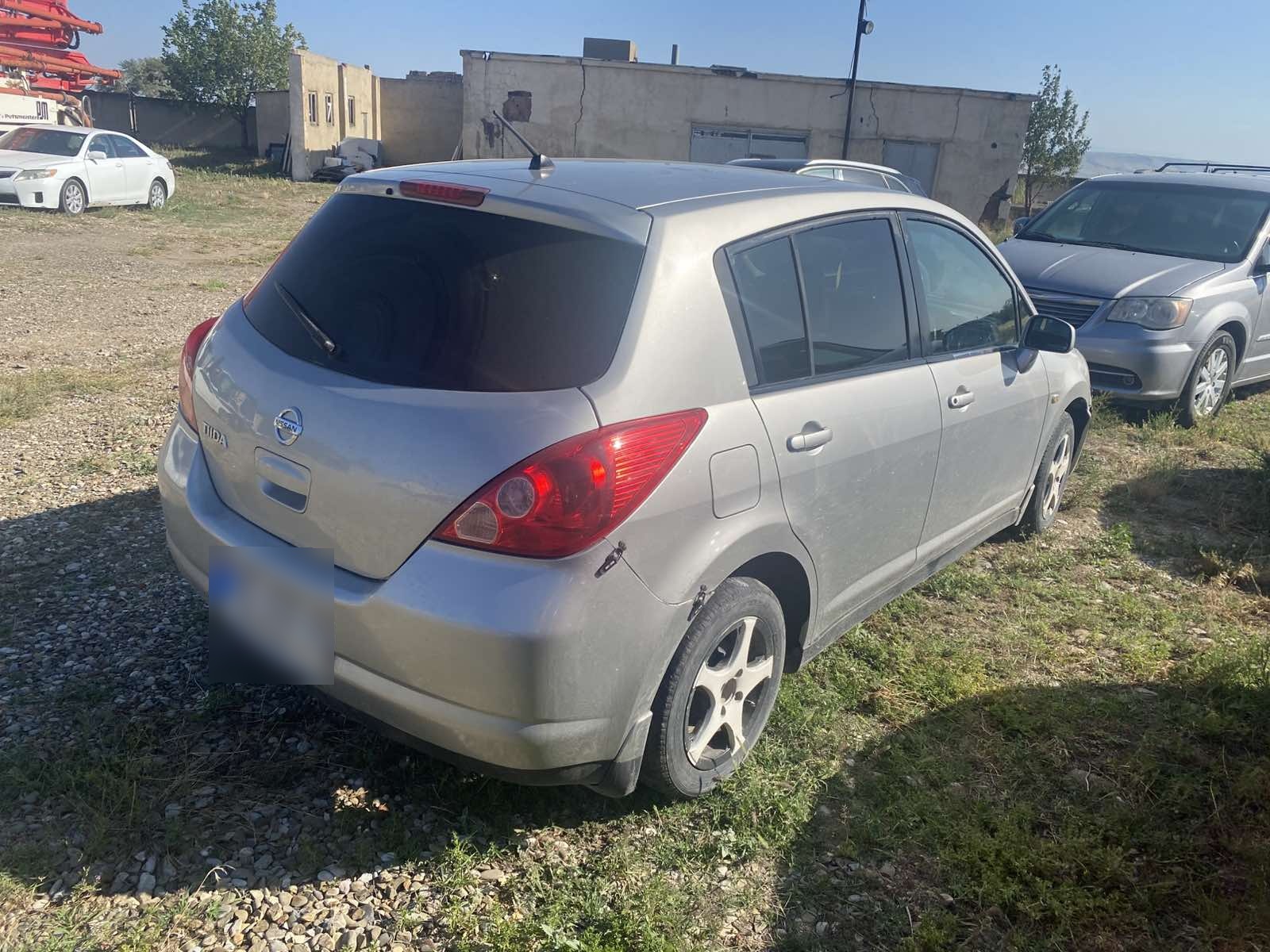 Nissan Tiida 2004 — photo 2