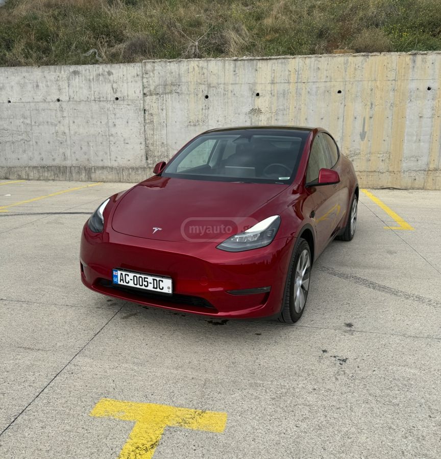 Tesla Model Y 2024 — photo 2