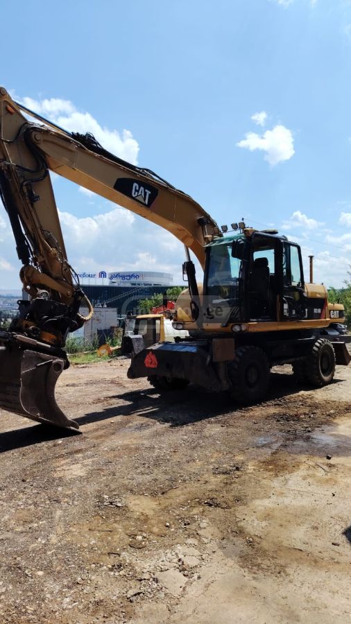 Caterpillar M316 2008 — photo 2