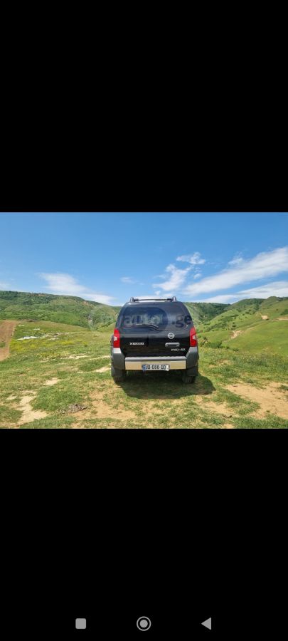 Nissan Xterra 2011 — photo 2