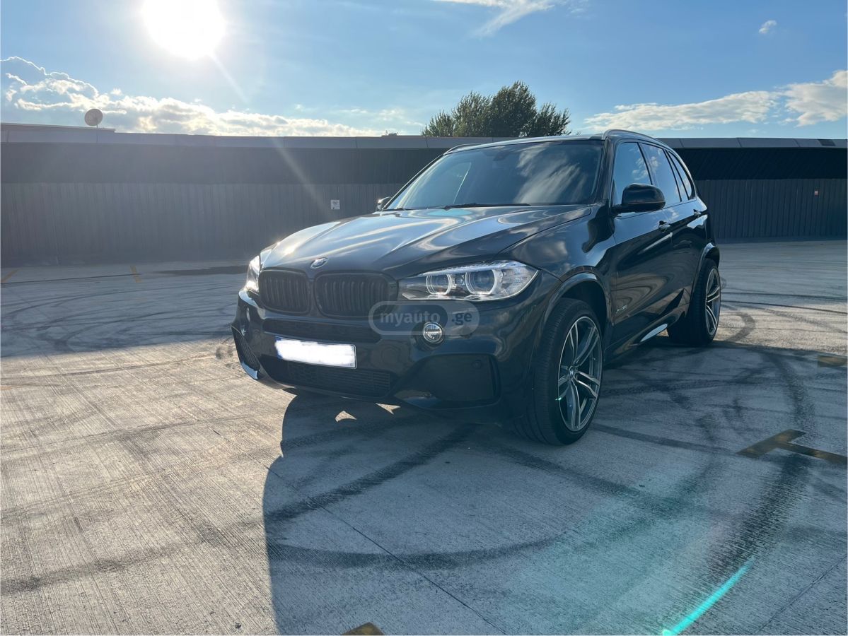 BMW X5 2014 — photo 2