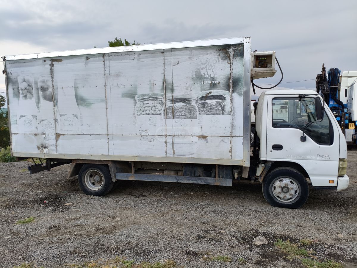 Isuzu NKR 55 2008 — photo 2