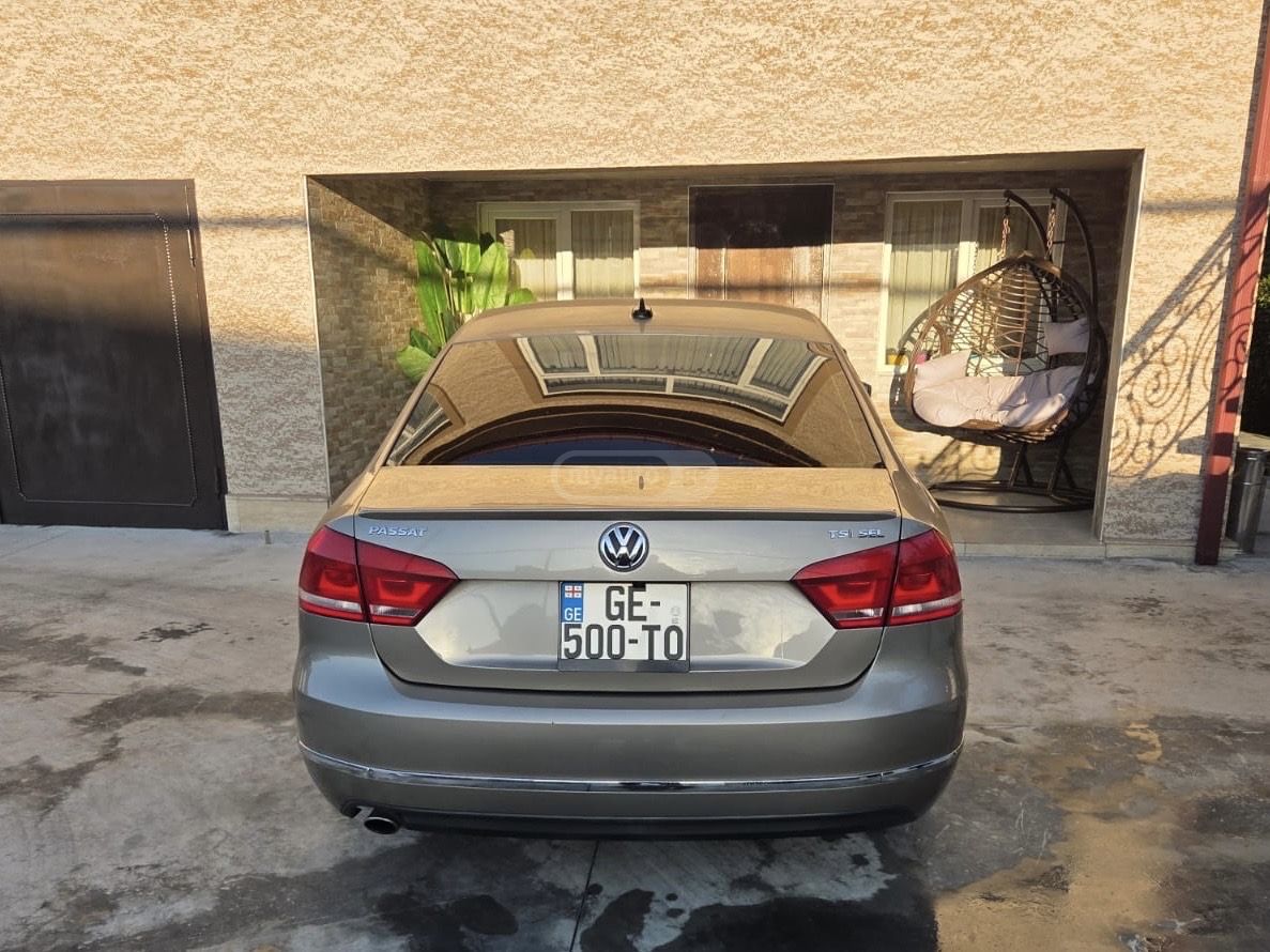 Volkswagen Passat 2014 — photo 2