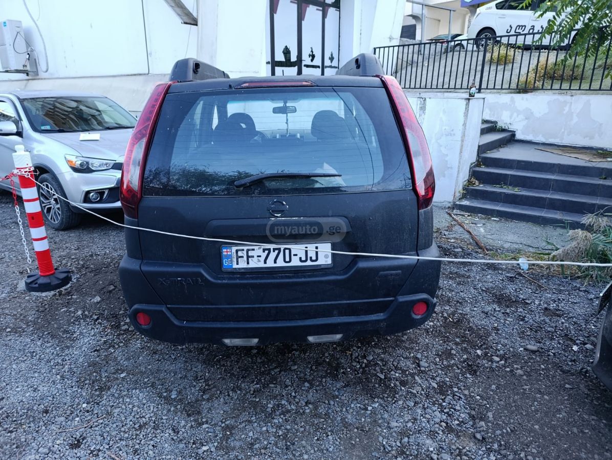 Nissan X-Trail 2010 — photo 2