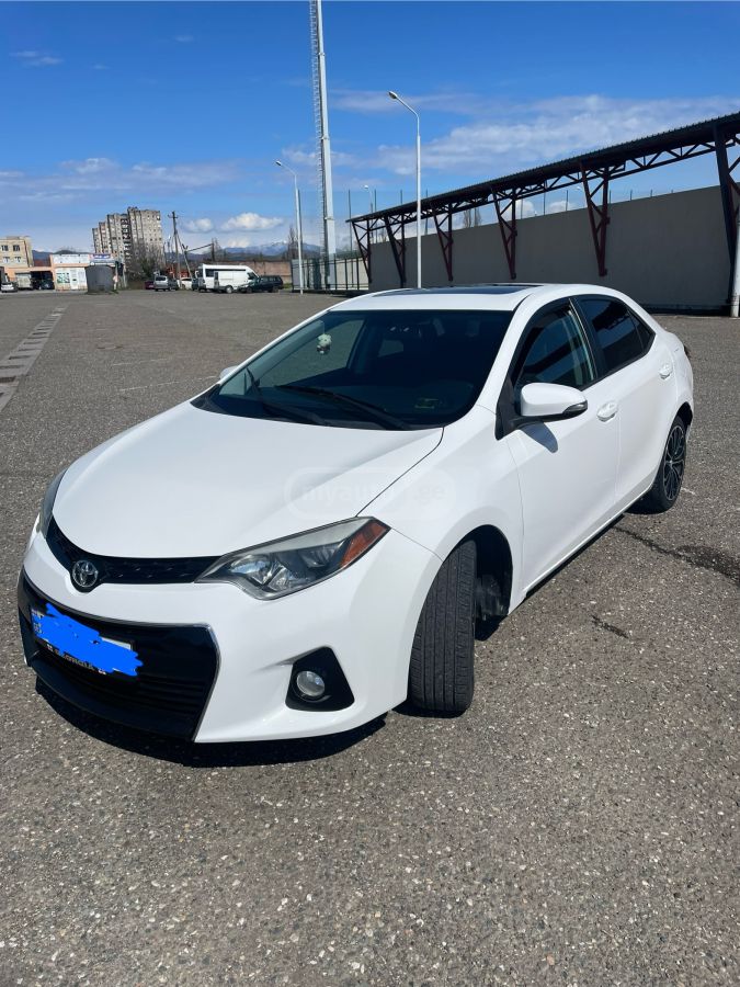 Toyota Corolla 2014 — photo 2