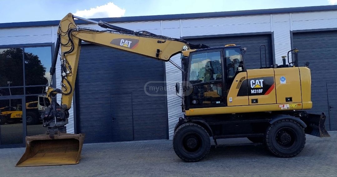 Caterpillar M318 2019 — photo 2