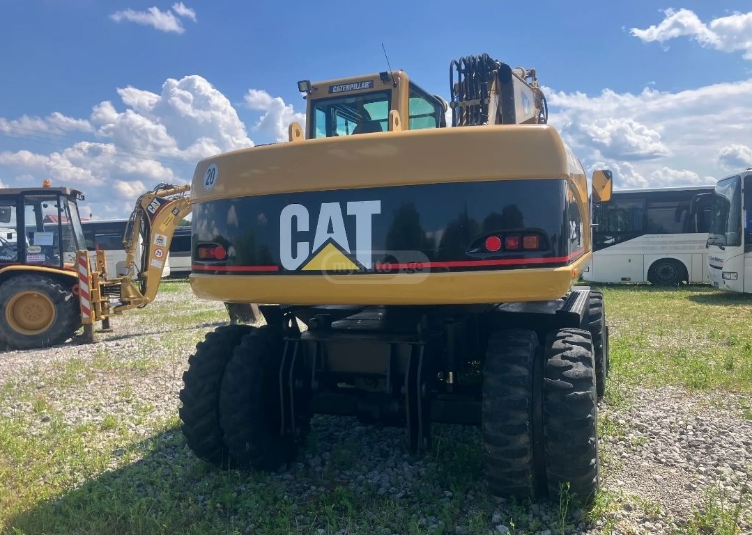 Caterpillar M316 2005 — photo 2