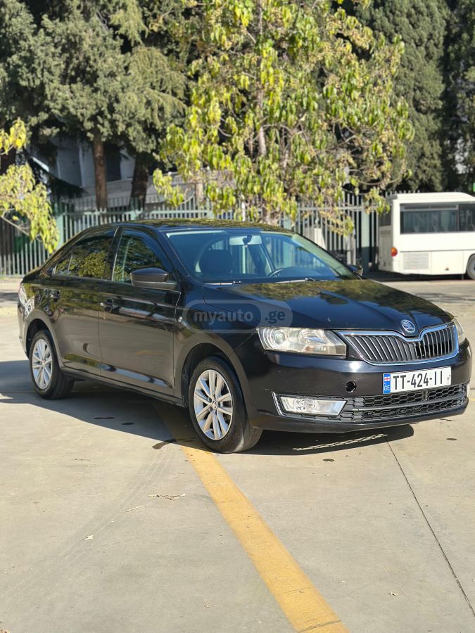 Skoda Rapid 2014 — photo 2