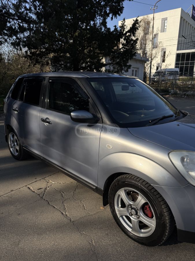 Mazda Verisa 2005 — photo 2