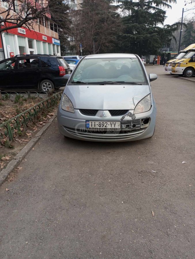 Mitsubishi Colt 2006 — photo 2