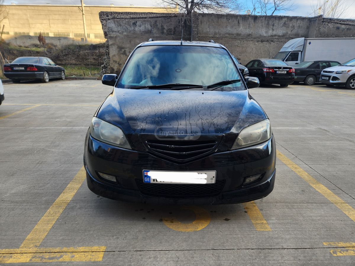Mazda Demio 2003 — photo 2