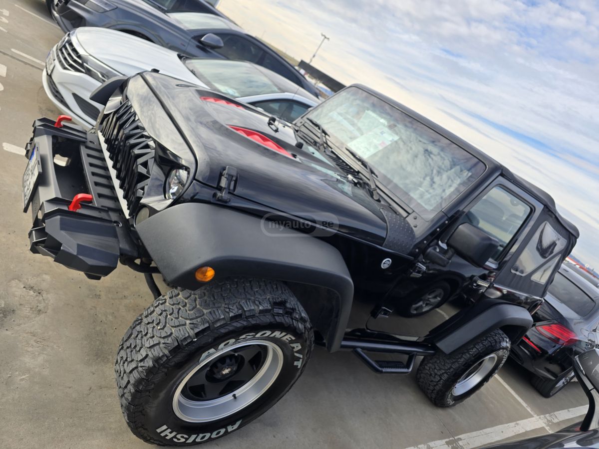 Jeep Wrangler 2014 — photo 2