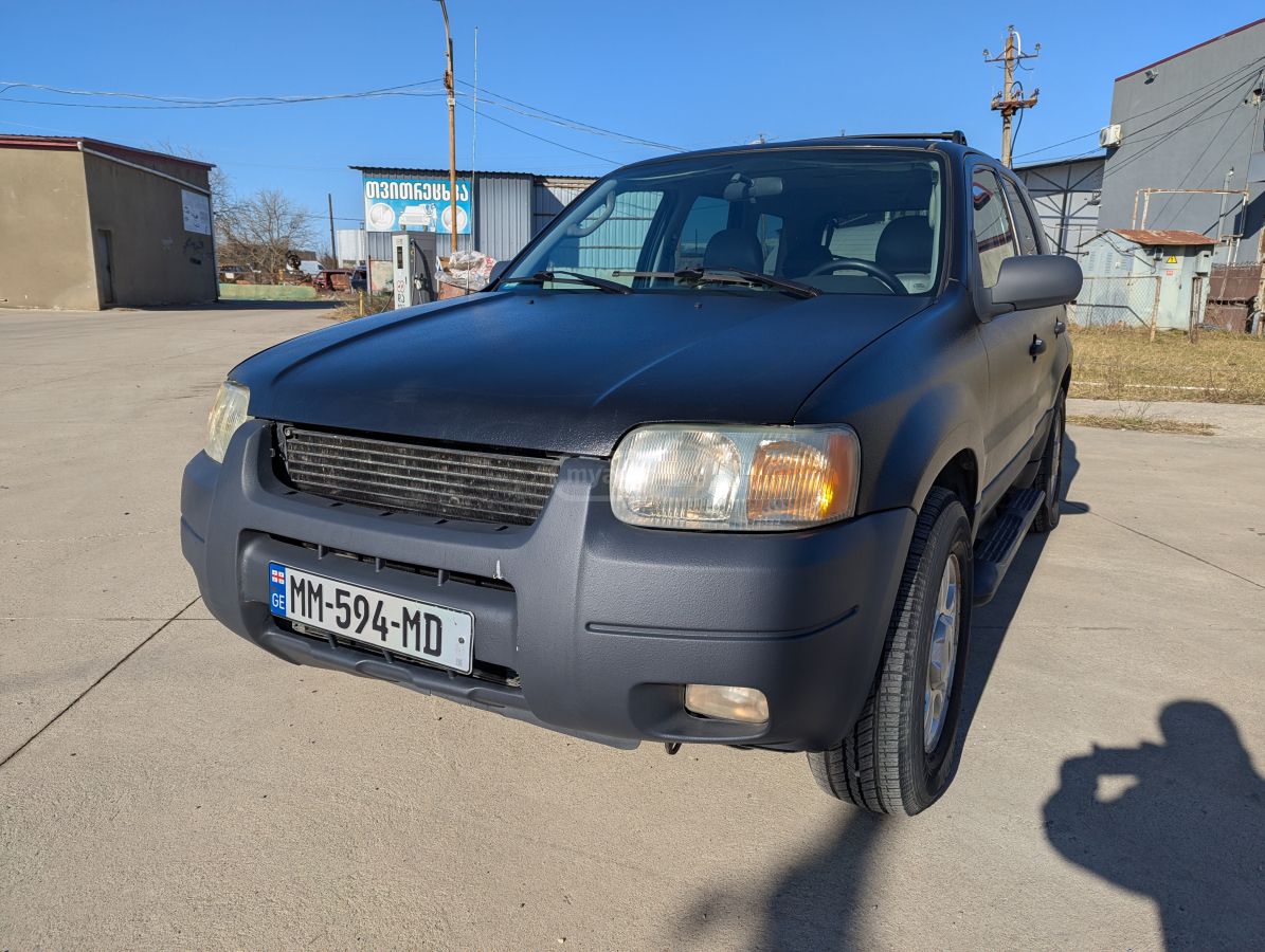 Ford Escape 2003 — photo 2