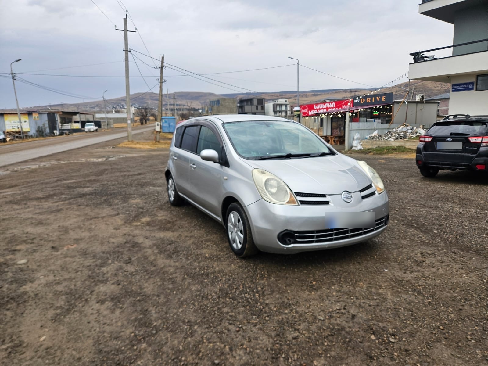 Nissan Note 2006 — photo 2