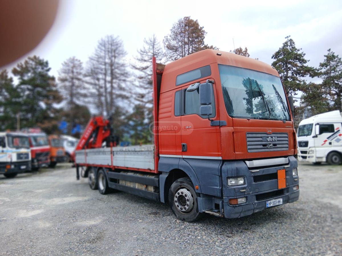 Isuzu TGA 26.400 2004 — photo 2