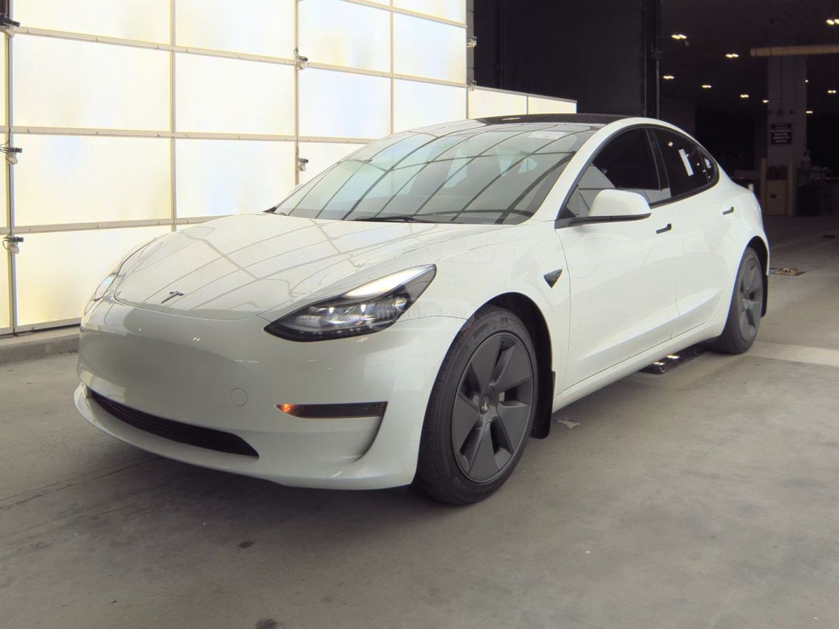 Tesla Model 3 2023 — photo 2