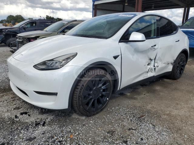 Tesla Model Y 2023 — photo 2