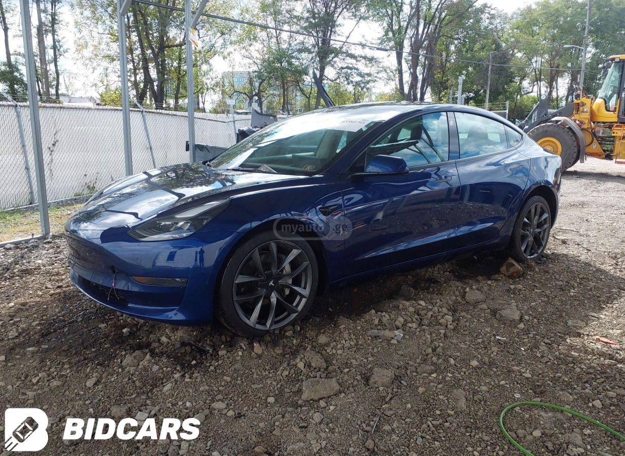 Tesla Model 3 2023 — photo 2