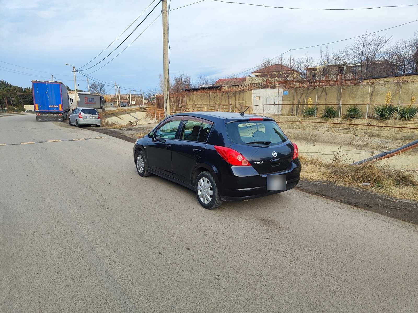 Nissan Tiida 2005 — photo 2