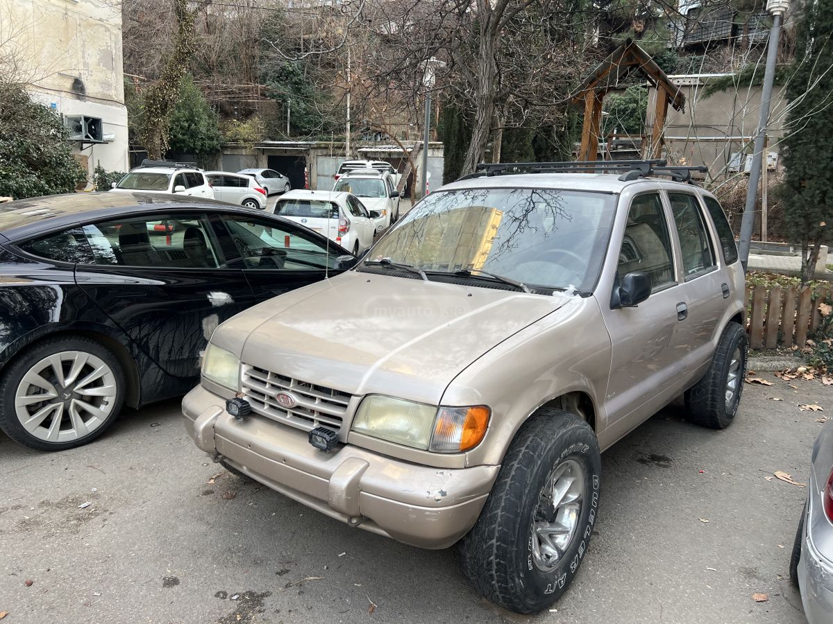 Kia Sportage 1998 — photo 2