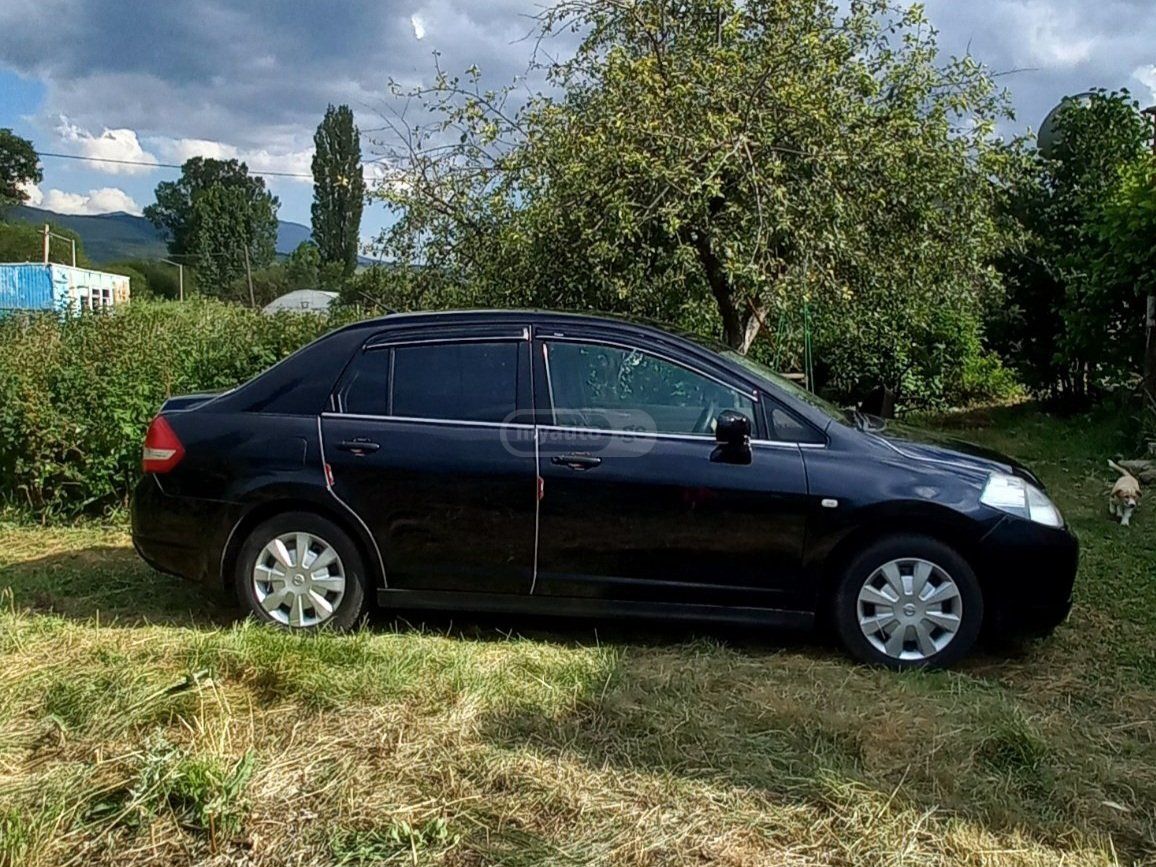 Nissan Tiida 2005 — photo 2