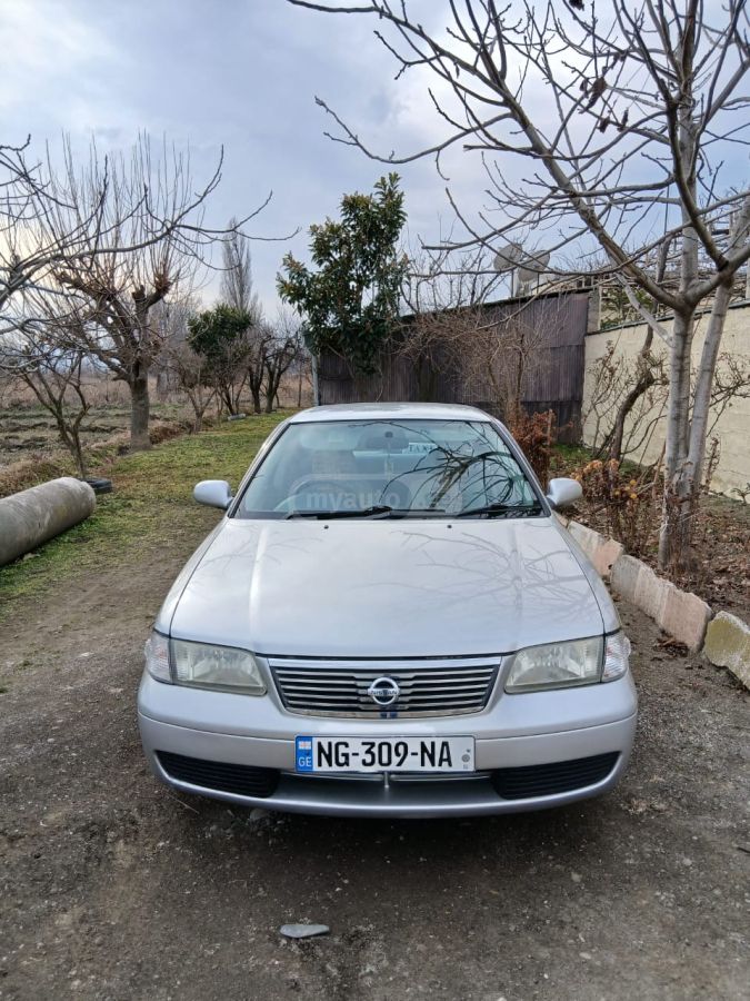Nissan Sunny 2004 — photo 2