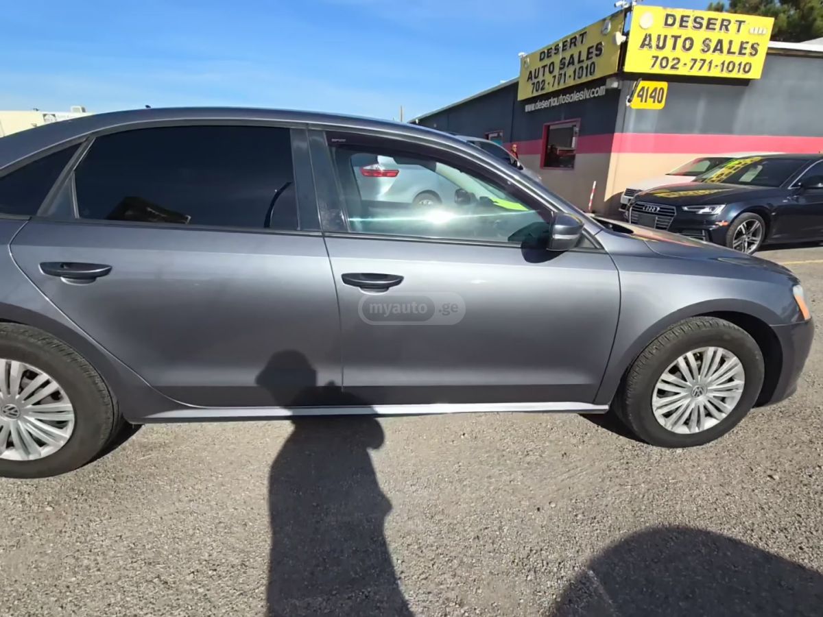 Volkswagen Passat 2014 — photo 2