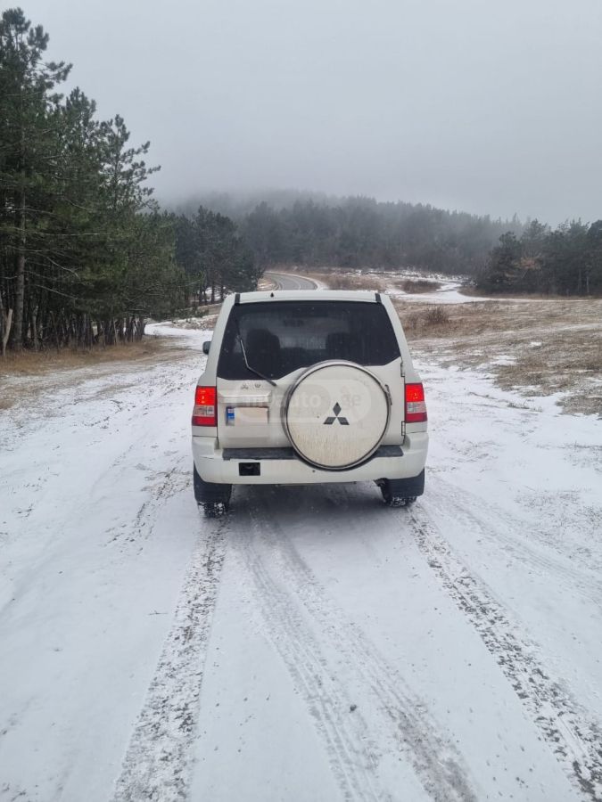 Mitsubishi Pajero IO 2004 — photo 2