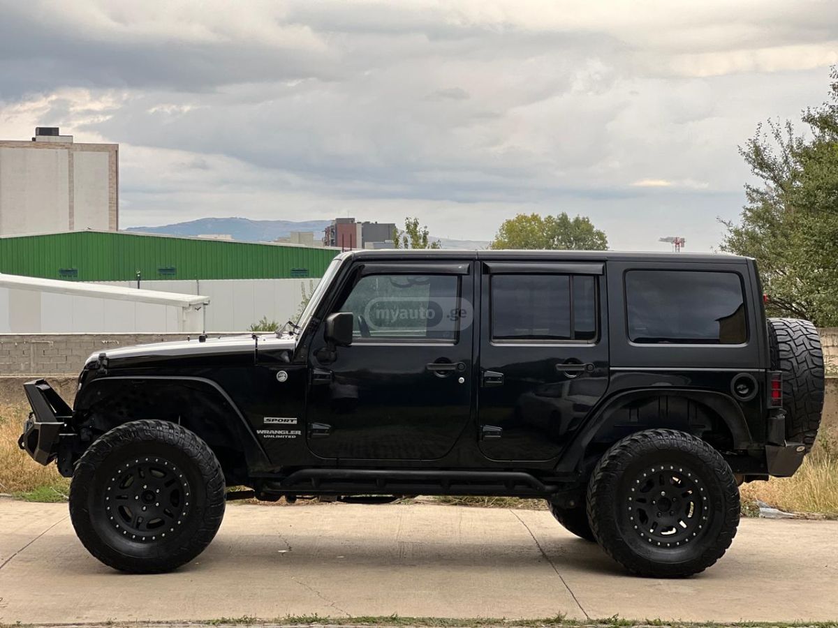Jeep Wrangler 2014 — photo 2