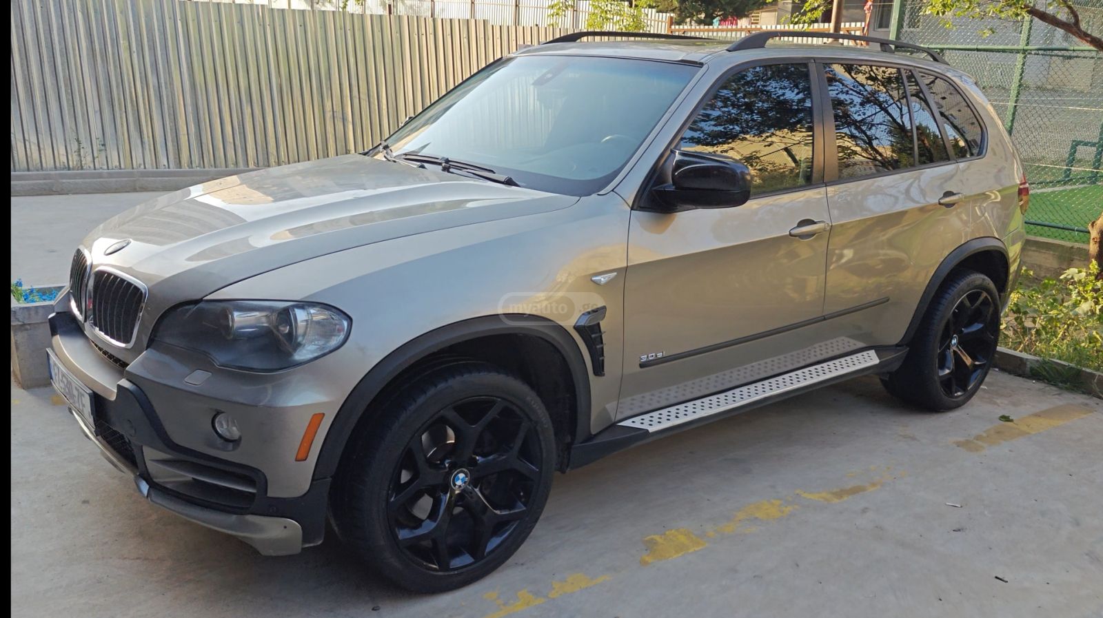 BMW X5 2009 — photo 2