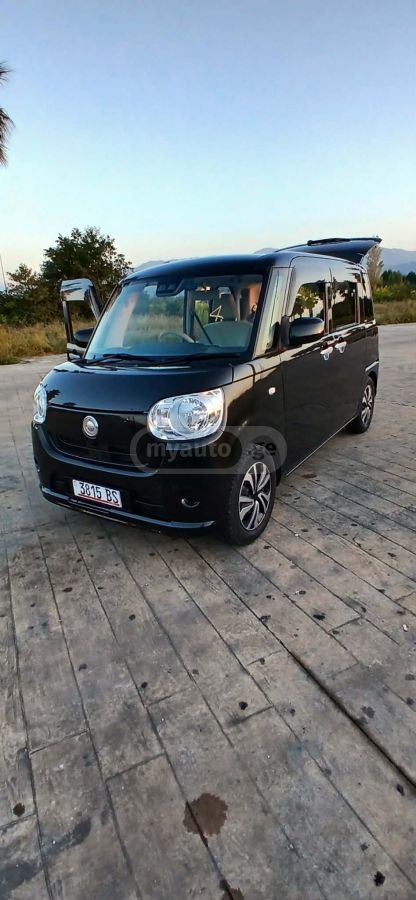 Daihatsu Move 2018 — photo 2