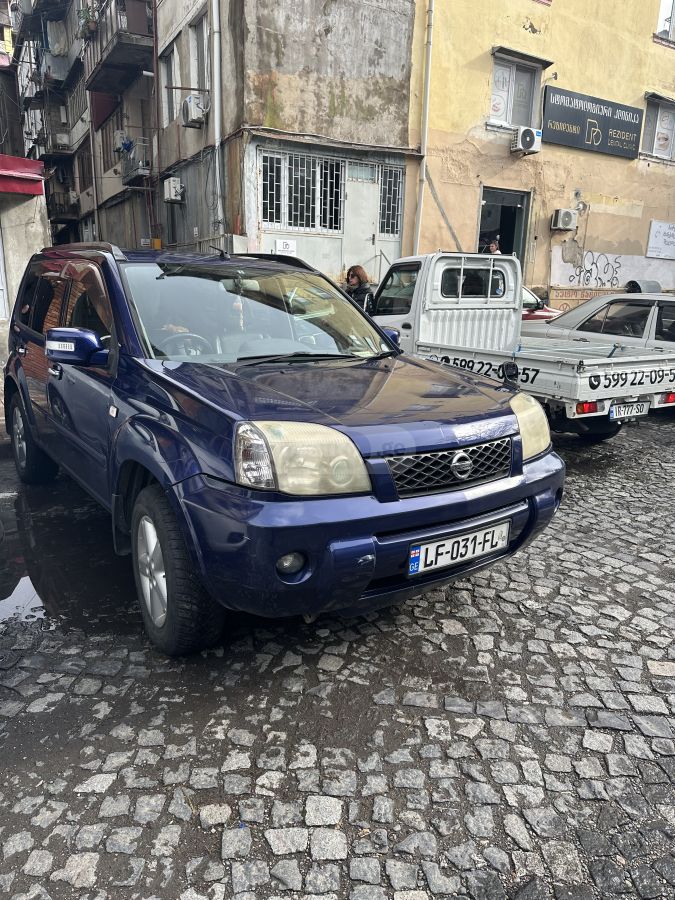 Nissan X-Trail 2004 — photo 2