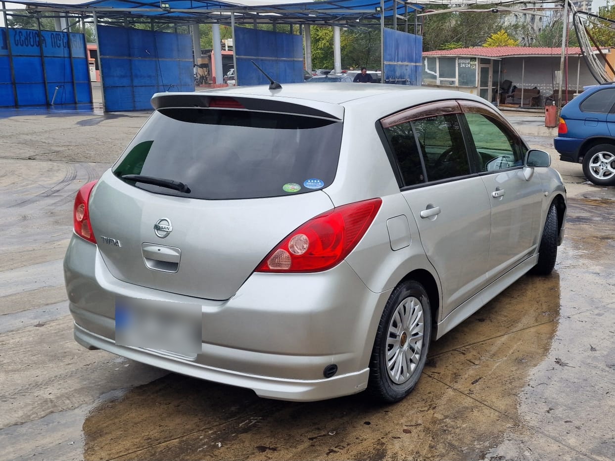 Nissan Tiida 2004 — photo 2