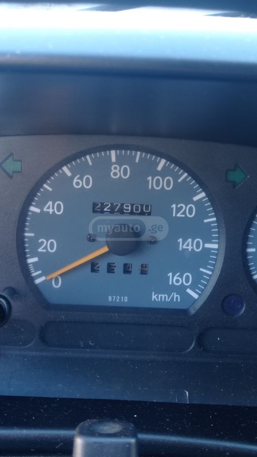 Daihatsu Cuore 1998 — photo 2