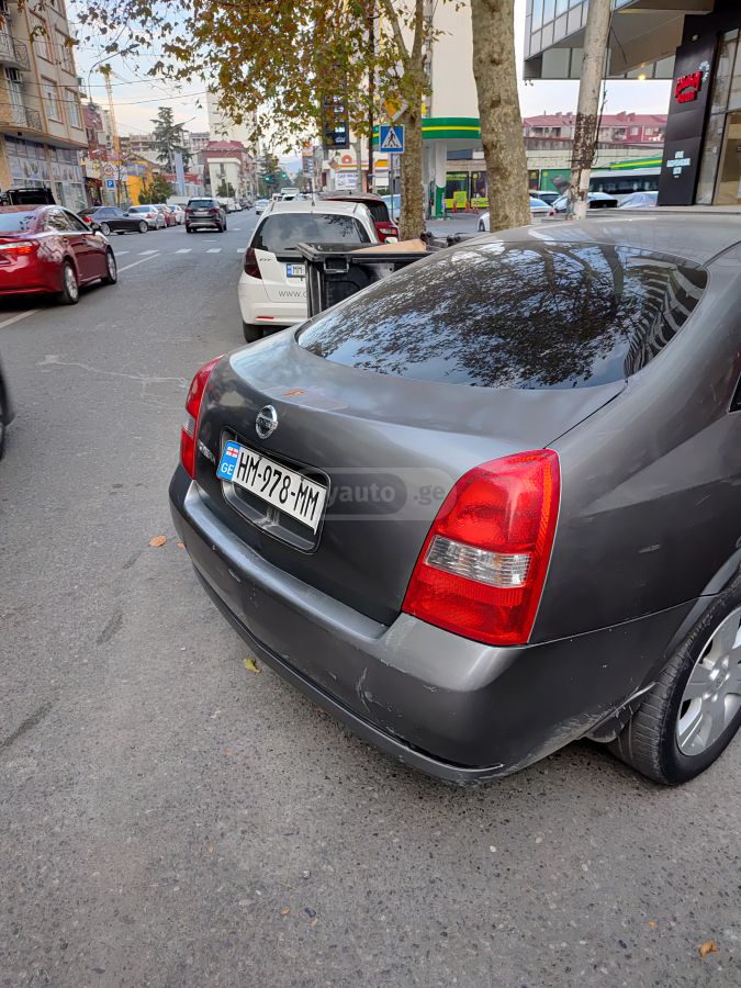 Nissan Primera 2004 — photo 2