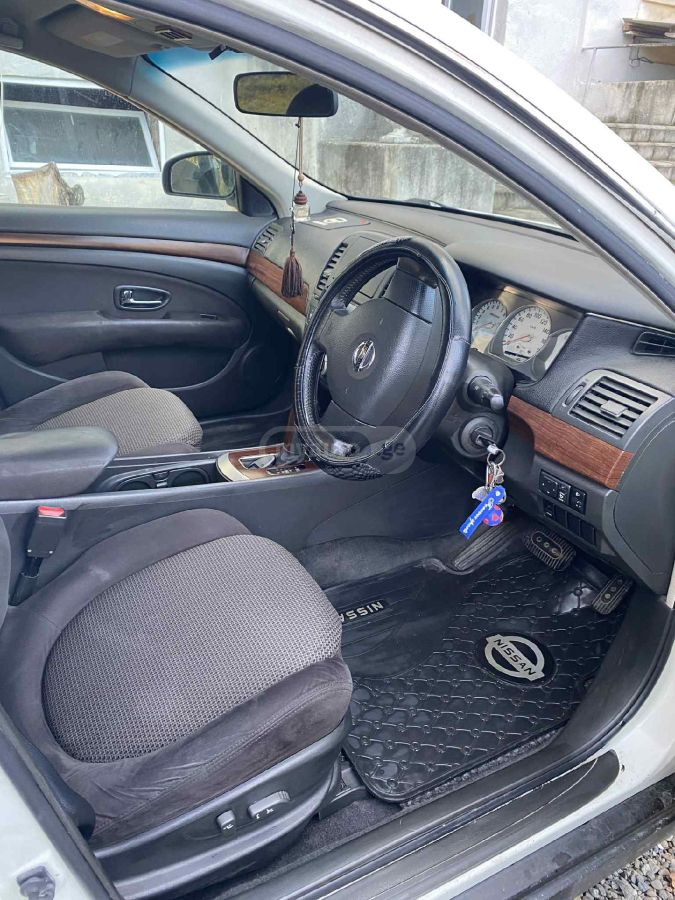 Nissan Bluebird 2006 — photo 2