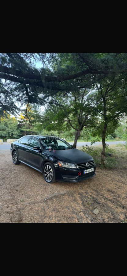 Volkswagen Passat 2013 — photo 2