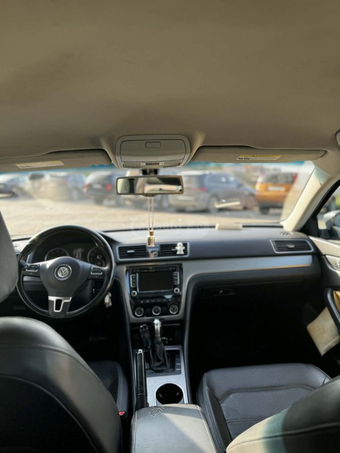 Volkswagen Passat 2013 — photo 2