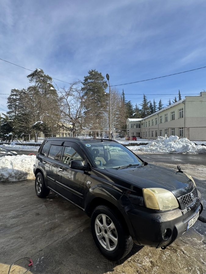 Nissan X-Trail 2004 — photo 2