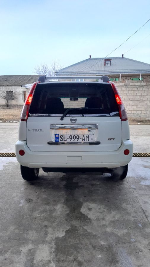 Nissan X-Trail 2005 — photo 2