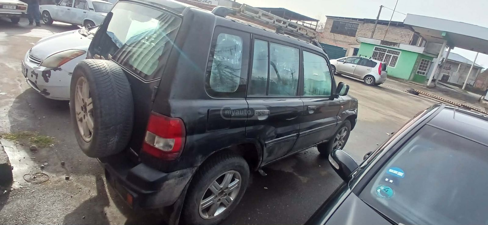 Mitsubishi Pajero IO 2002 — photo 2
