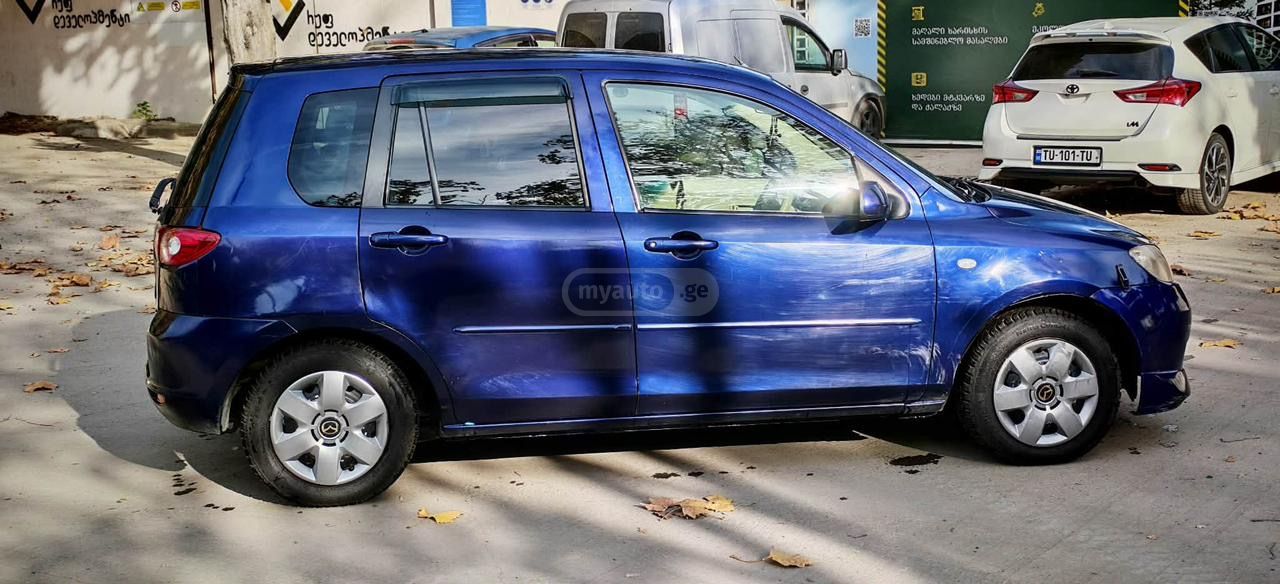 Mazda Demio 2005 — photo 2