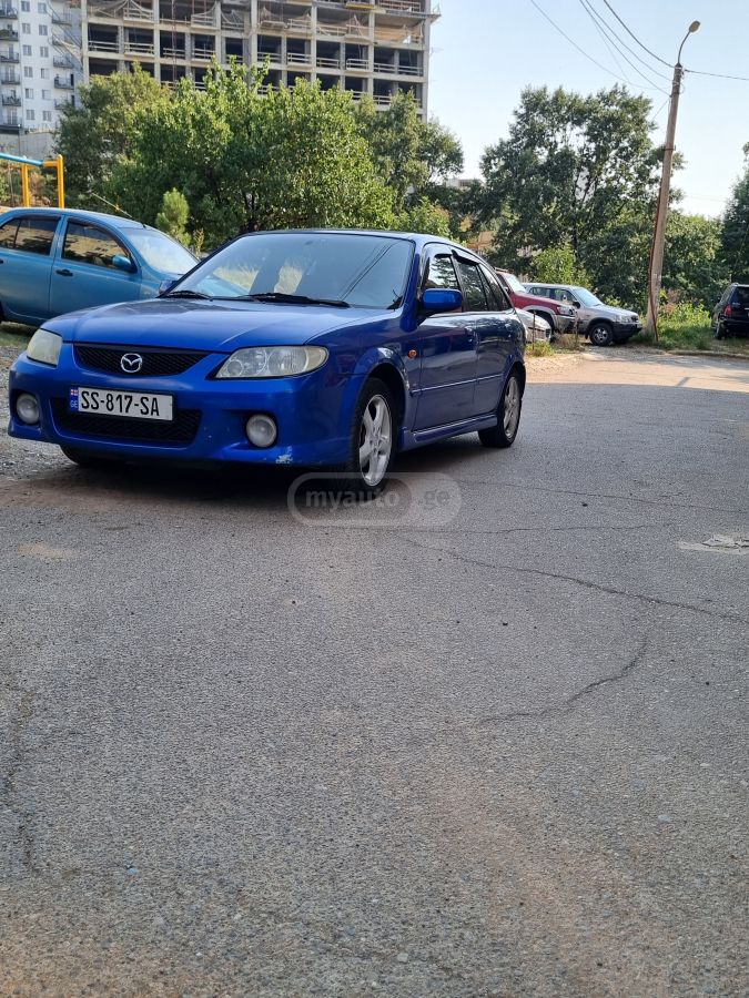 Mazda 323 2002 — photo 2