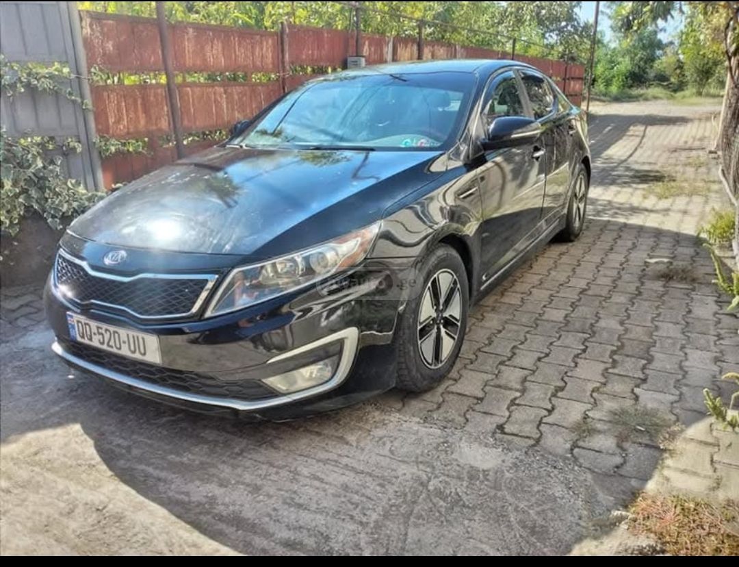Kia Optima 2011 — photo 2