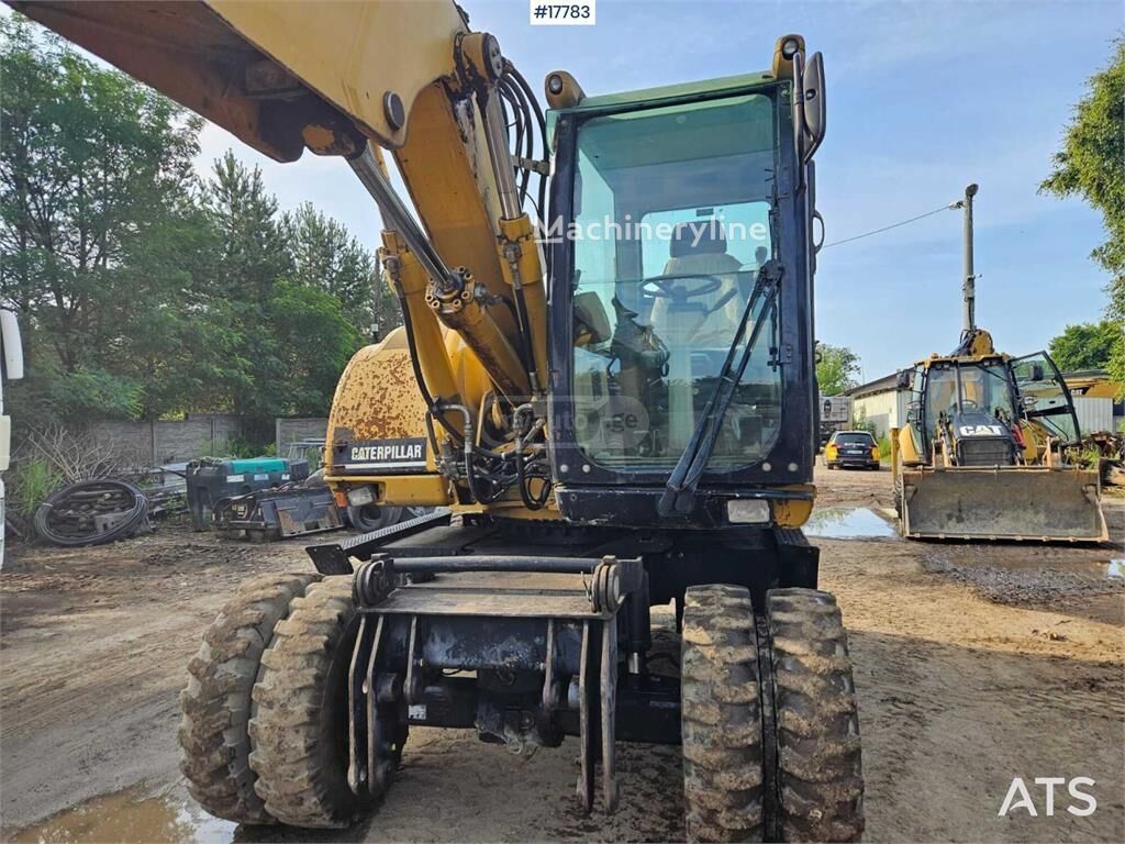Caterpillar M315 2006 — photo 2