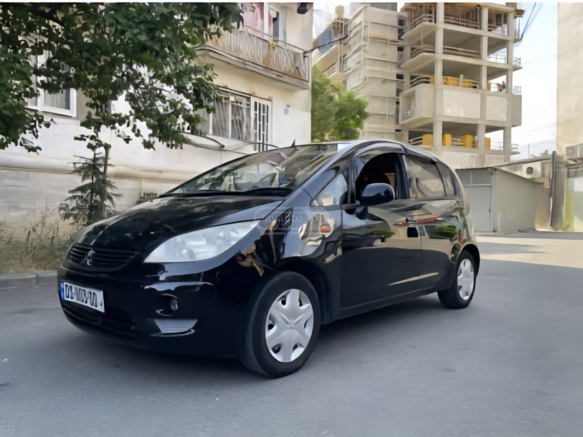 Mitsubishi Colt 2010 — photo 2