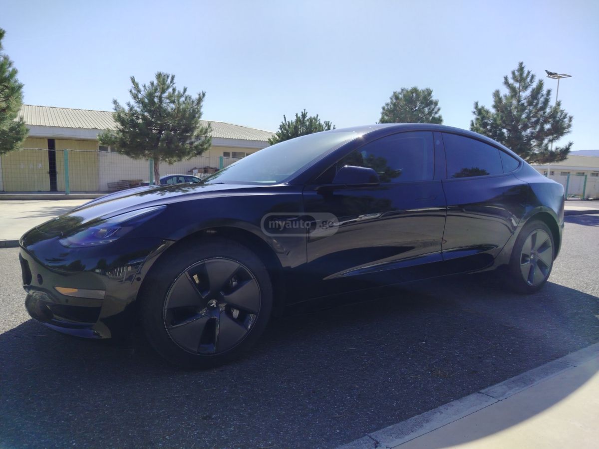 Tesla Model 3 2023 — photo 2