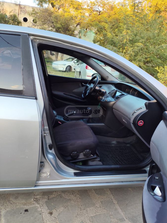 Nissan Primera 2003 — photo 2