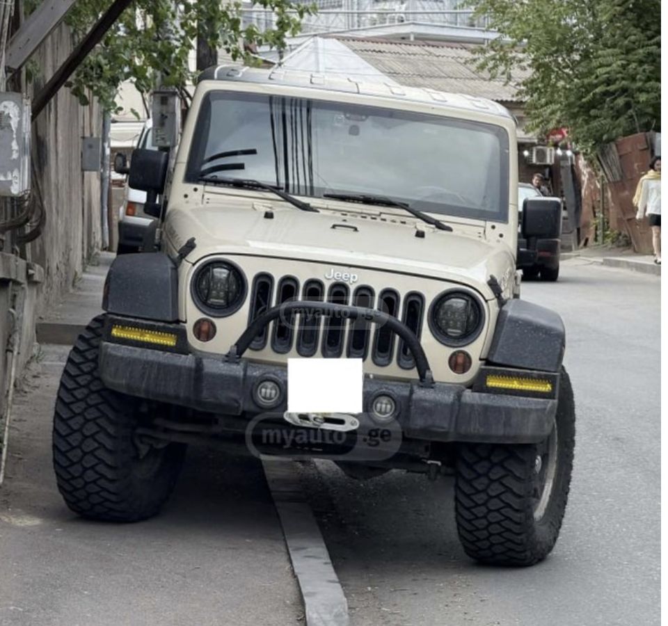 Jeep Wrangler 2011 — photo 2